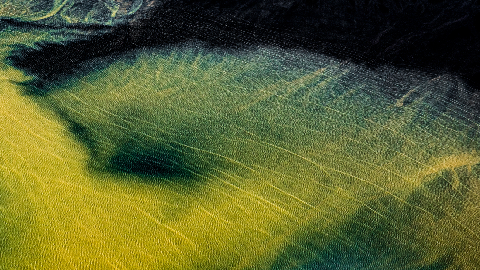 Digital 3D terrain visualization with green, yellow and blue wireframe contours representing elevation and depth.