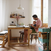Man and baby at the dining room table